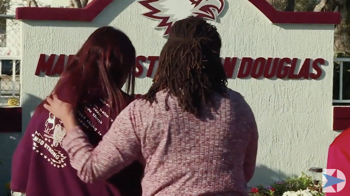 Mourners outside Marjory Stoneman Douglas High School.