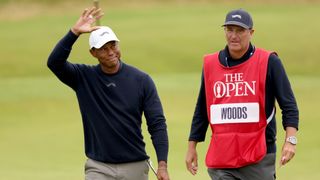 Tiger Woods and his caddie at The Open at Royal Troon