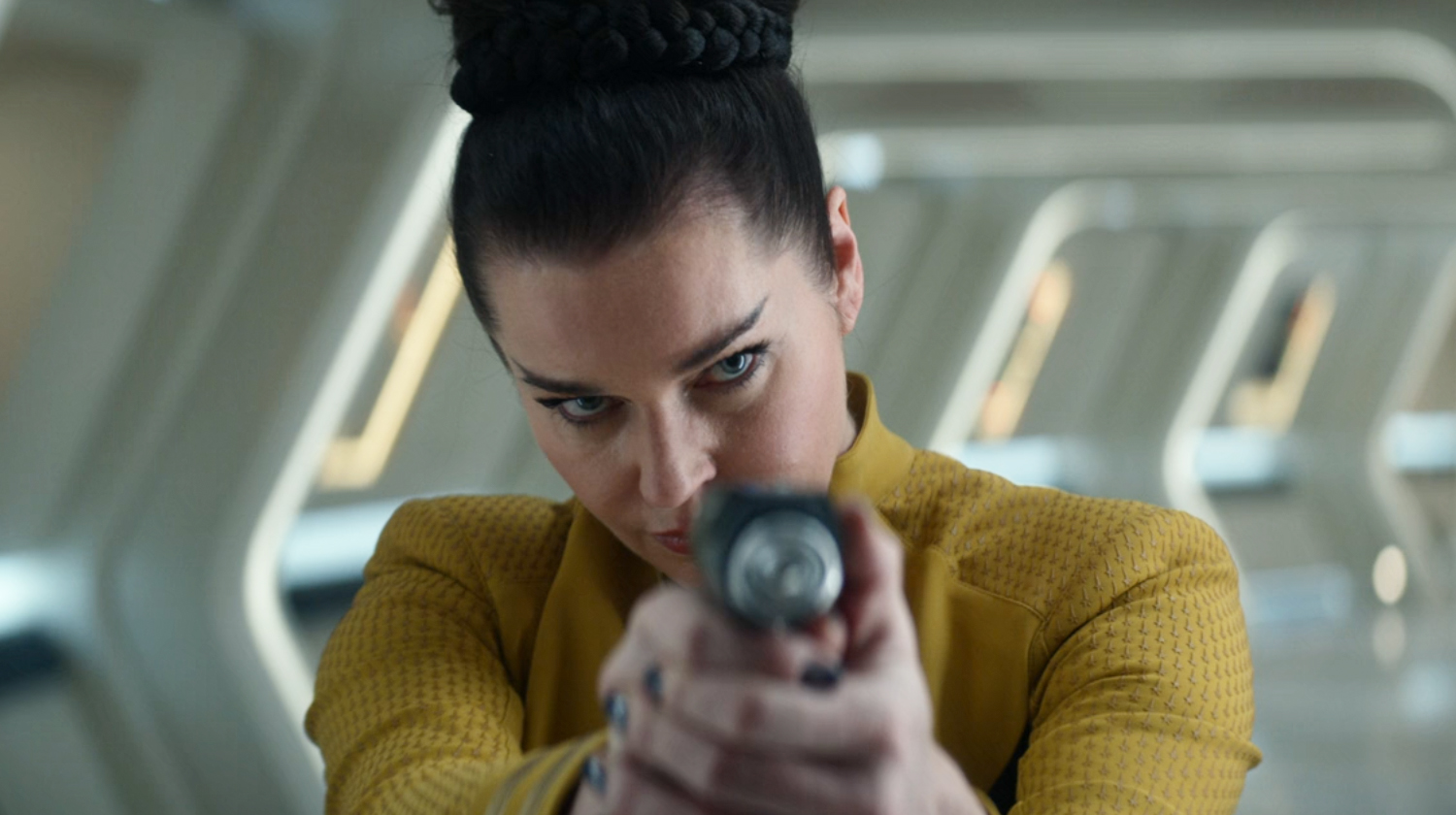 Number One holding a phaser on Star Trek: Strange New Worlds.