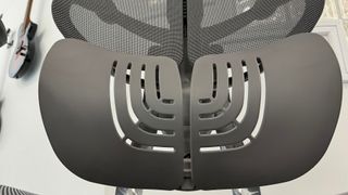 A close up of the lumbar support of the Hinomi X1 chair.