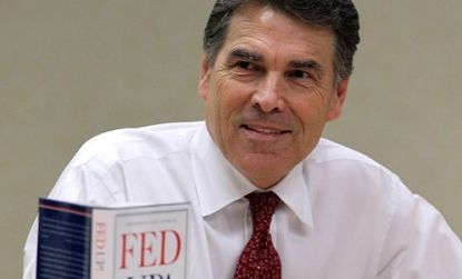 Texas Gov. Rick Perry at a book signing in June 2011: The GOP presidential candidate may be stepping back from his firry criticism of federal social security system.