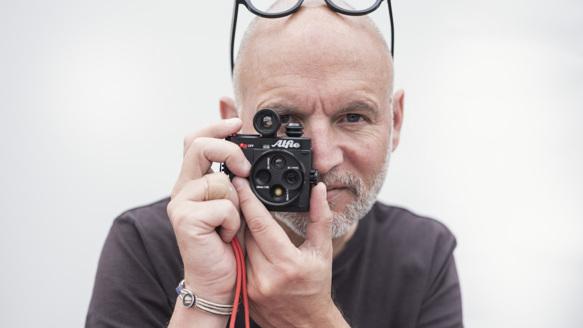 Alfie Tych camera held up to photographer's eye