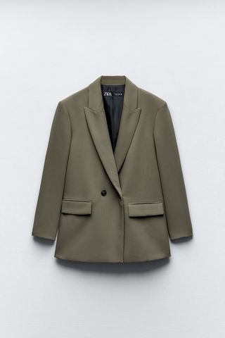 taupe blazer with black buttons