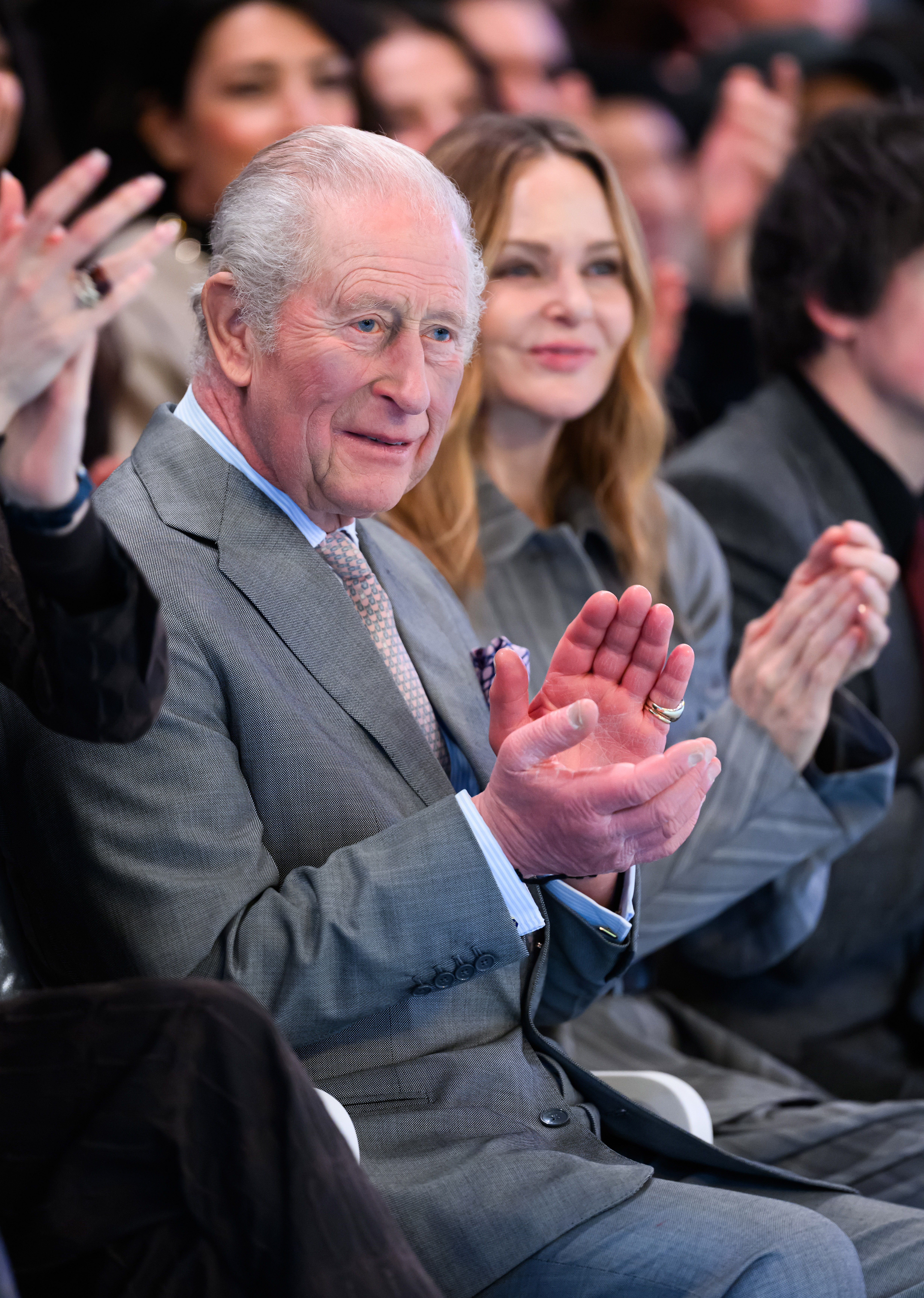 King Charles sits front row at the Tolu Coker show at London Fashion Week.