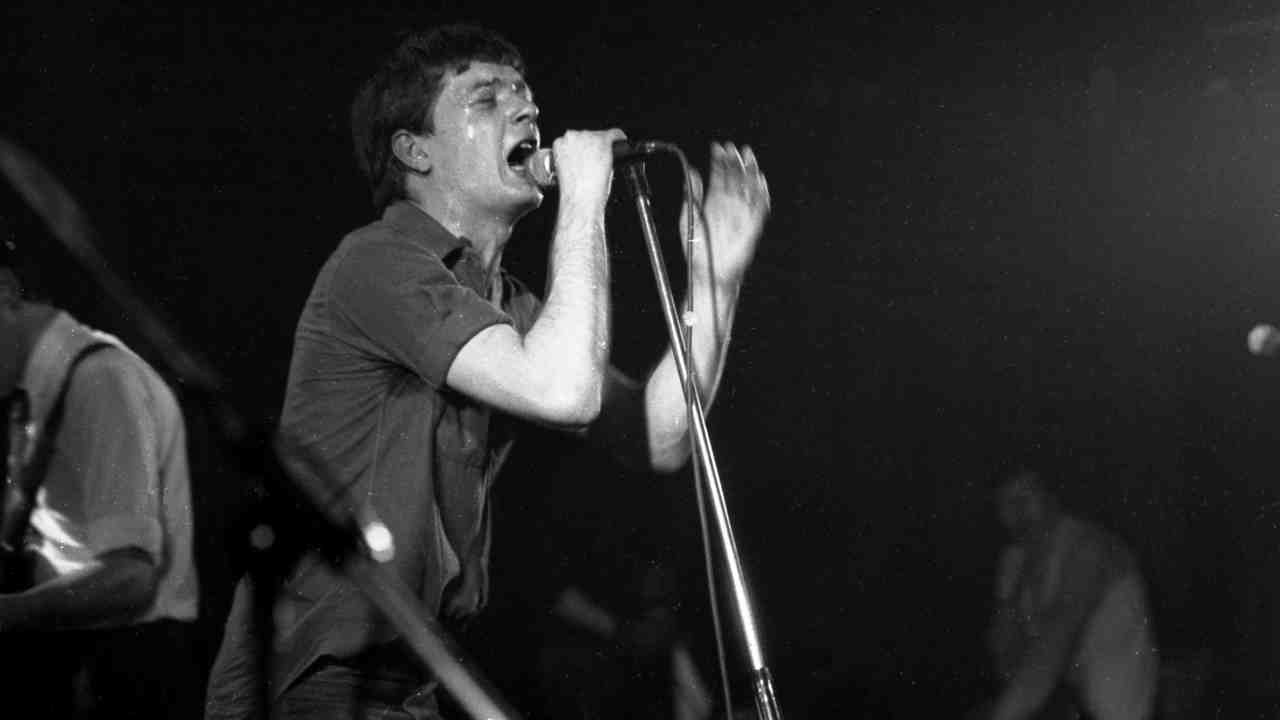 Joy DIvision performing onstage in 1980