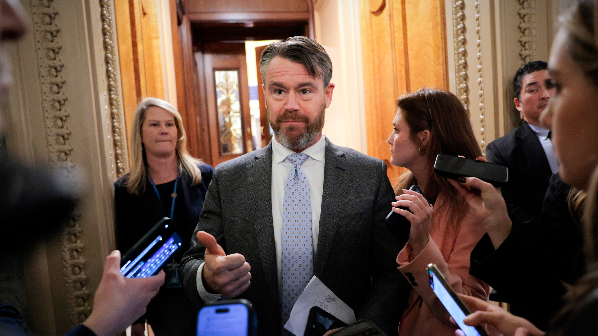 Sen. Todd Young (R-Ind.) talks to reporters about Venezuela war powers vote