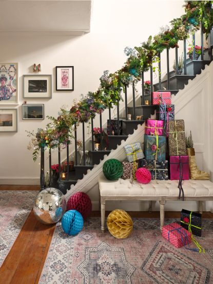Christmas stair decor ideas Colourful Christmas staircase garland by Wayfair 