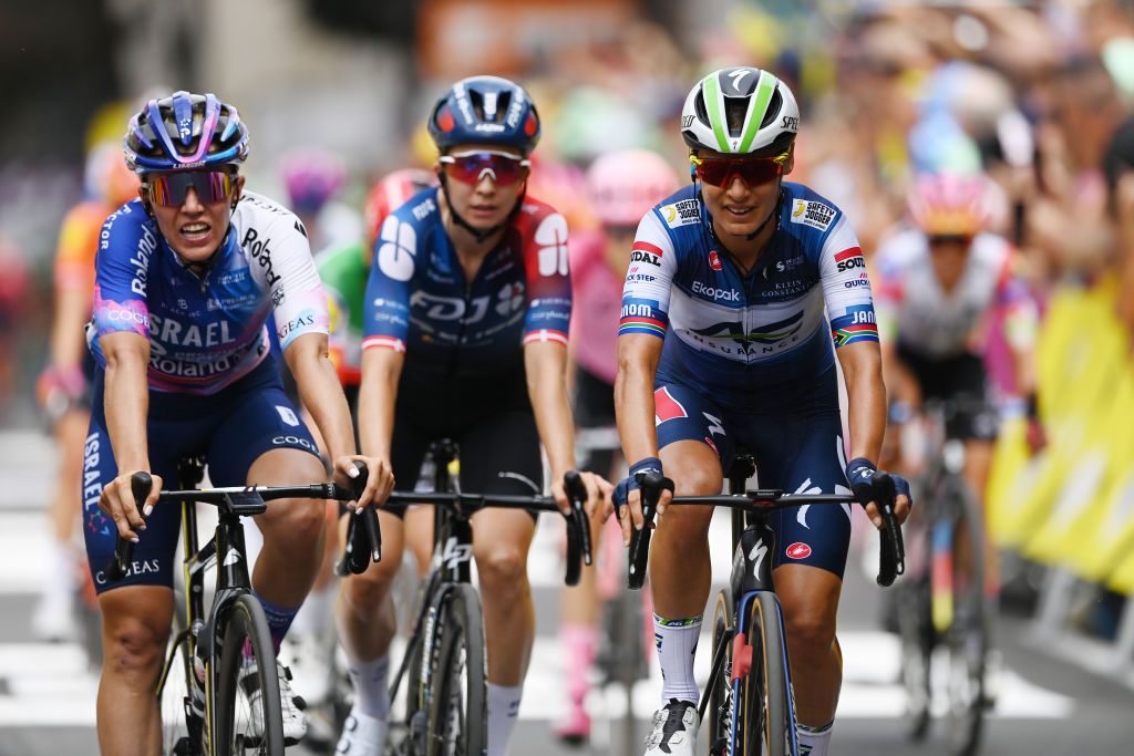 CLERMONTFERRAND FRANCE JULY 23 LR Tamara DronovaBalabolina of Russia and Team Israel Premier Tech Roland and Ashleigh Moolman of South Africa and Team AG Insurance Soudal QuickStep cross the finish line during the 2nd Tour de France Femmes 2023 Stage 1a 1234km stage from ClermontFerrand to ClermontFerrand UCIWWT on July 23 2023 in ClermontFerrand France Photo by Tim de WaeleGetty Images