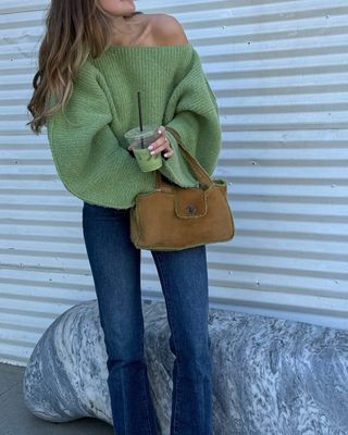 Green sweater outfit with jeans