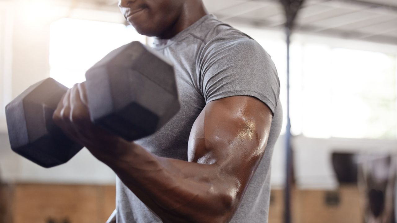 Man doing dumbbell bicep curl