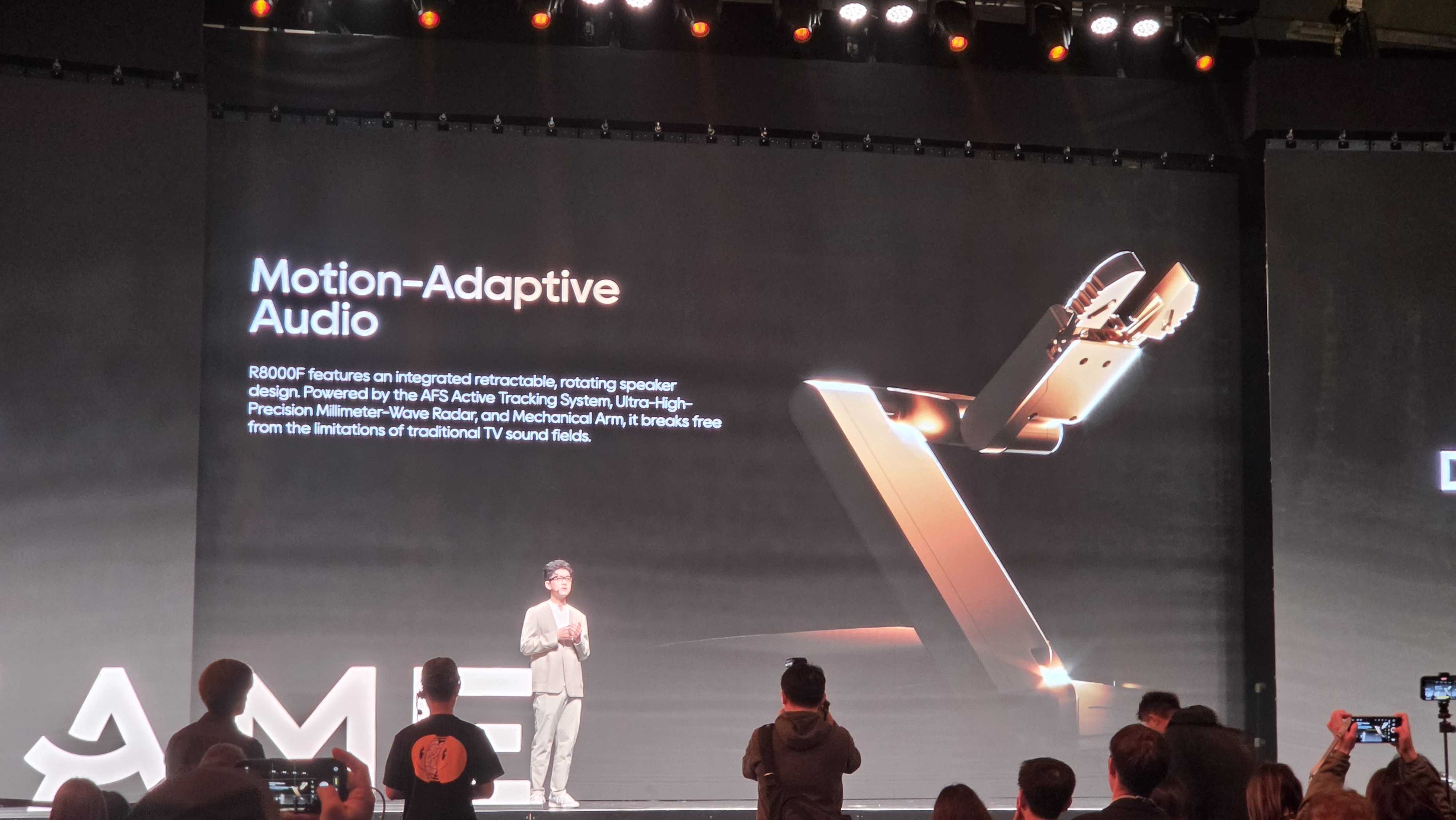 A Dreame robot with an extendable arm