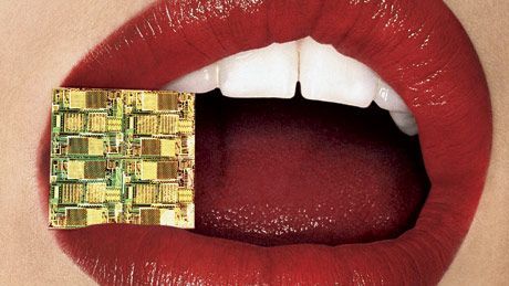 red lips biting computer chip