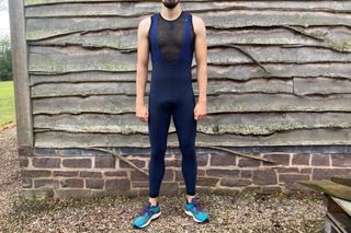 Image shows a rider wearing the Rapha Classic Winter Bib Tights with pad.