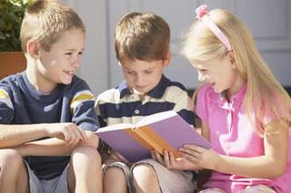 Kids reading a book