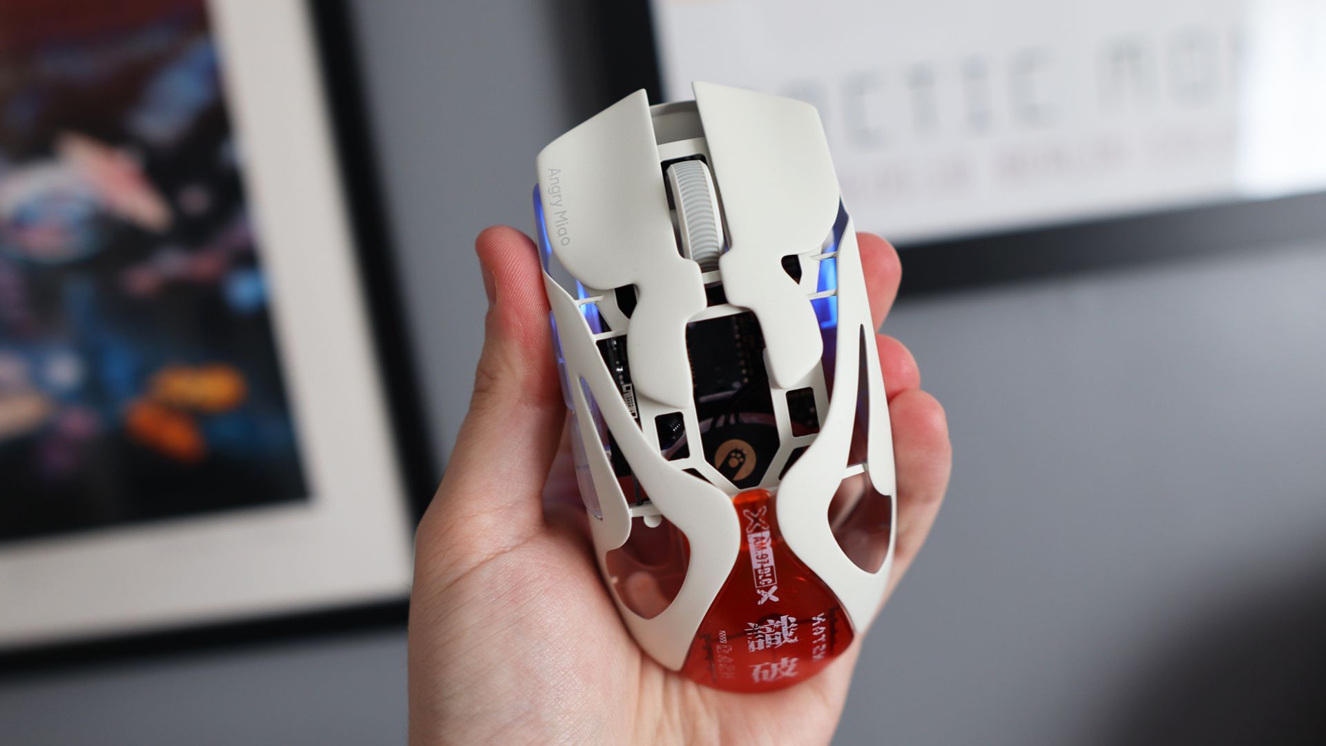 The AngryMiao AM Infinity.97 gaming mouse in hand for testing.