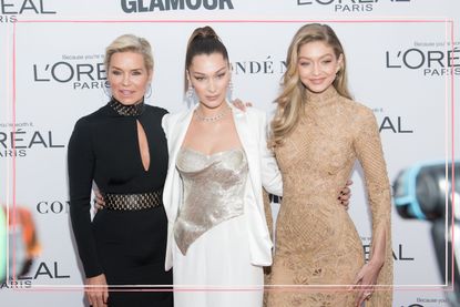 Left to right: Yolanda, Bella and Gigi Hadid at a red carpet event