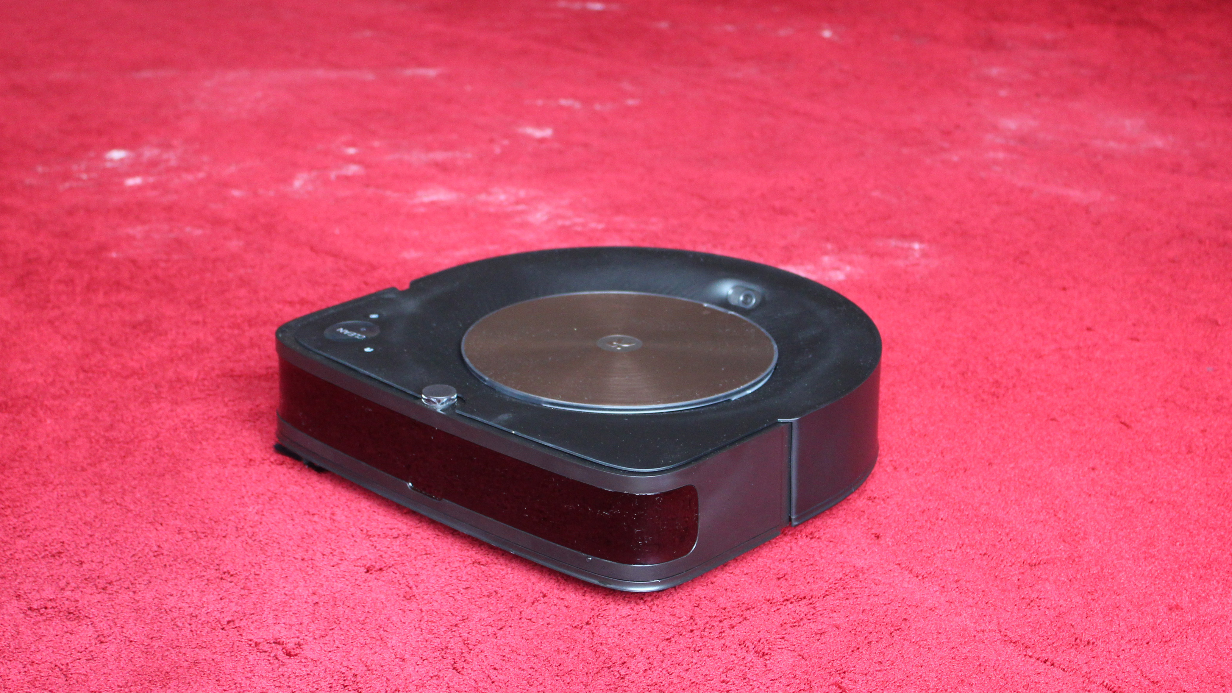 iRobot Roomba S9+  on a red carpet