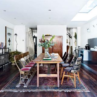 dining room with wooden flooring and table with chairs