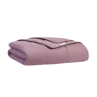 Folded purple weighted blanket
