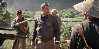 Aaron Eckhart surrounded in Midway