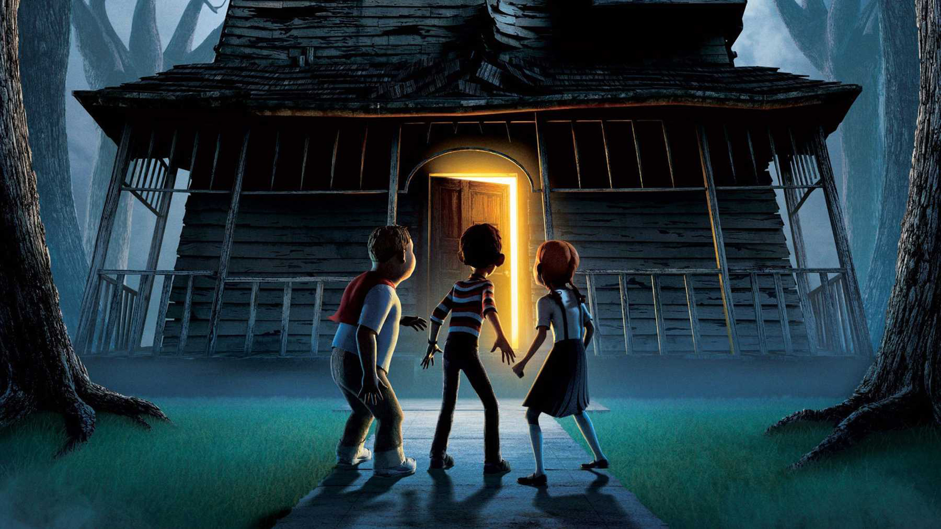 Three kids stand outside a ghost house in a forest