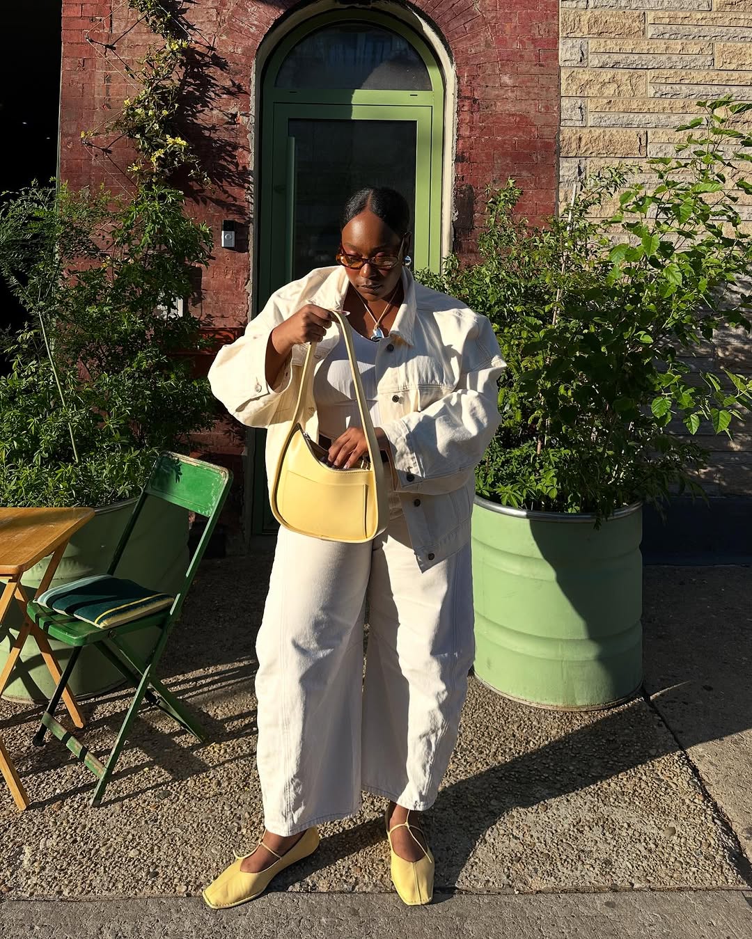 woman wearing winter to spring transitional pant trend 2026