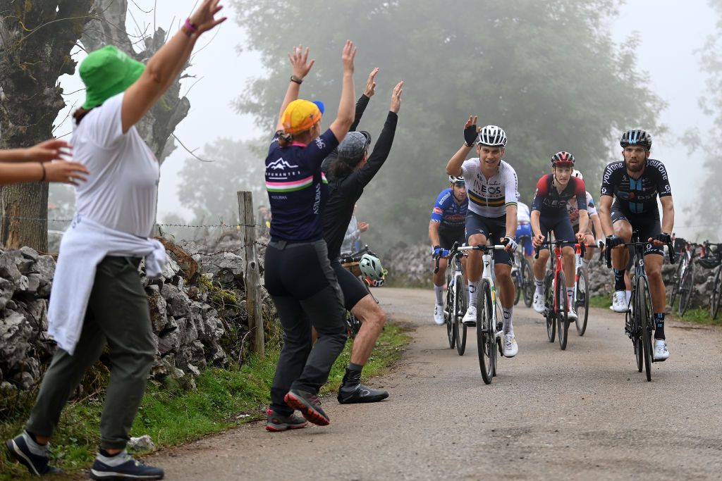 COLLU FANCUAYA SPAIN AUGUST 27 LR Luke Plapp of Australia and Team INEOS Grenadiers and Joris Nieuwenhuis of Netherlands and Team DSM compete while fans cheer during the 77th Tour of Spain 2022 Stage 8 a 1534km stage from Pola de Laviana to Collu Fancuaya 1084m LaVuelta22 WorldTour on August 27 2022 in Collu Fancuaya Spain Photo by Justin SetterfieldGetty Images