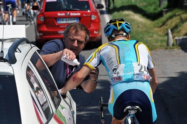 Levi Leipheimer sought assistance from the race doctor to tend to cuts suffered in a crash.