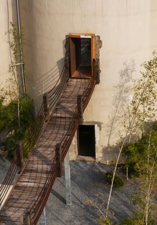 Bridge for entrance to Buduo Teahouse by Wanmu Shazi, a chinese industrial building transformation