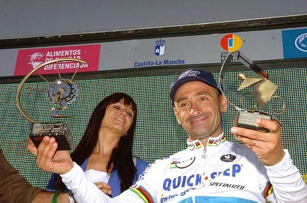 Paolo Bettini shows off his trophies.