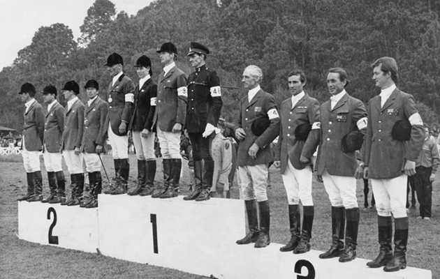 Australian rider Bill Roycroft (1915 - 2011, fourth from right) with his team on the podium after the mixed team three-day eventing at the Mexico City Olympics, 21st October 1968. Roycroft's son Wayne is next to him (third from right). Great Britain won gold, with the USA second and Australia in third place. (Photo by Paul Popper/Popperfoto/Getty Images)