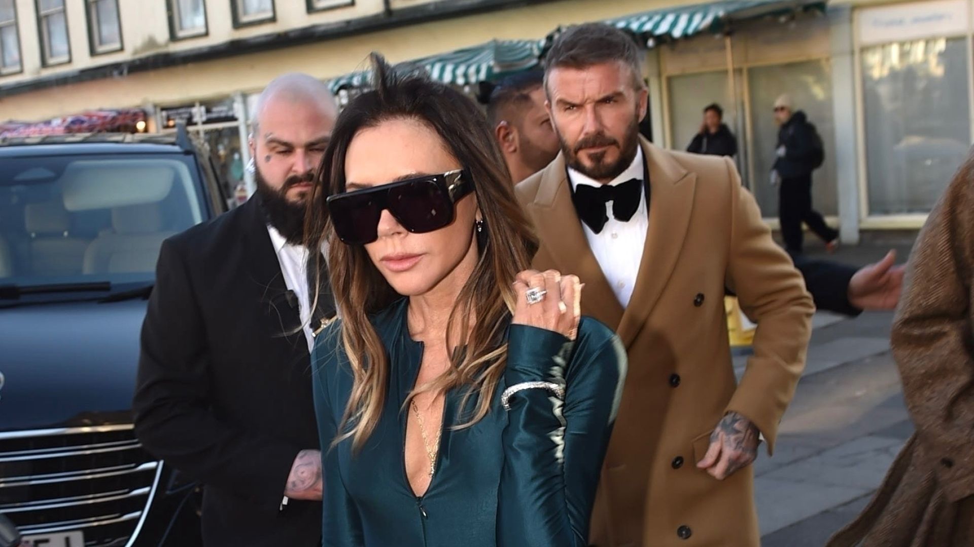Victoria Beckham Styles a Plunging Cut-Out Gown From Her Own Label for a Winter Wedding