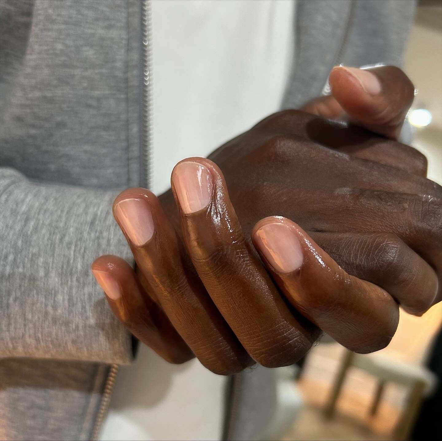 A picture of a clear, glossy manicure