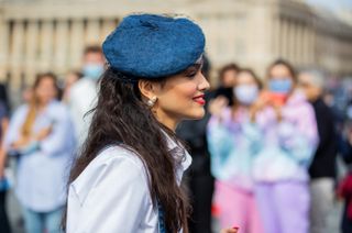a woman in a beret