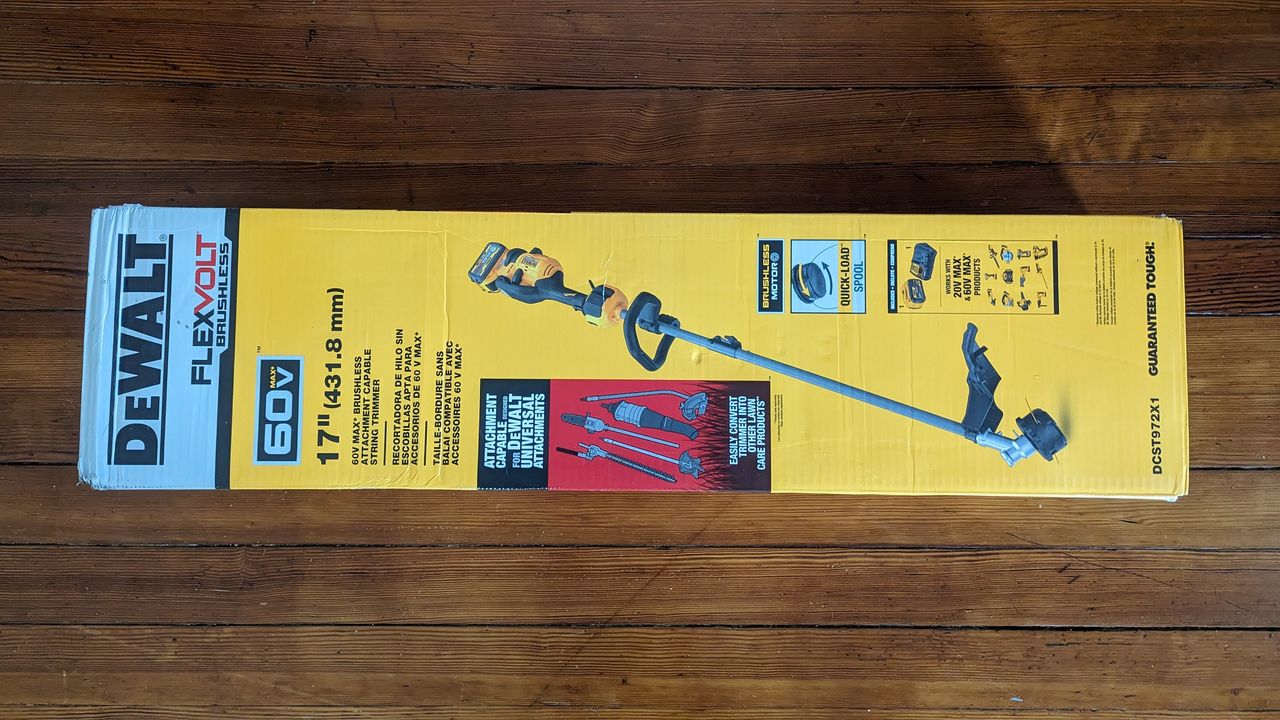dewalt cordless strimmer with brushcutter attachment in a box