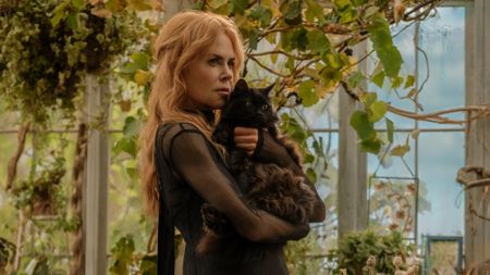 NICOLE KIDMAN as Gillian Owens holding a black cat while in a greenhouse in &ldquo;Practical Magic 2,&rdquo; a Warner Bros. Pictures release.
