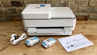 HP Envy Pro 6420 unboxed with ink cartridges and mains lead