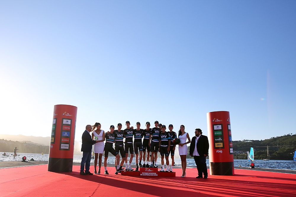 Team Sky riders celebrate on the Vuelta's stage 1 podium.