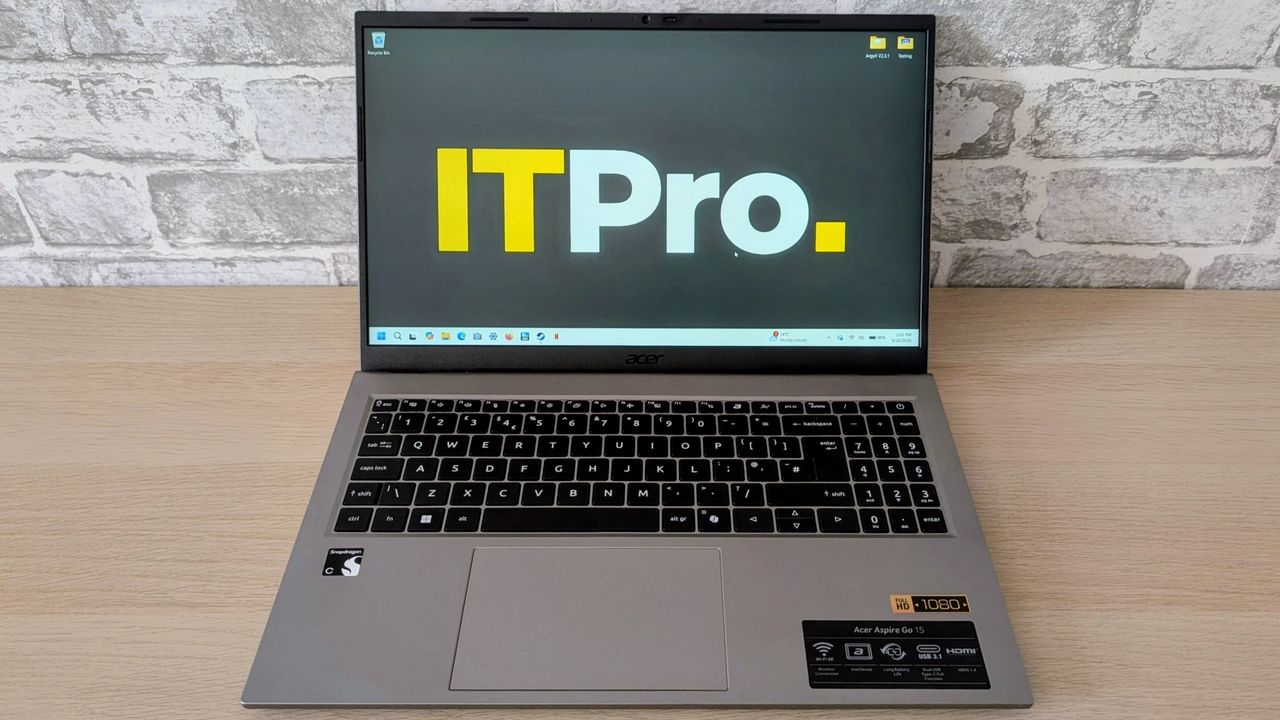The Acer Aspire Go on the ITPro background