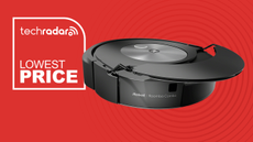 The Roomba j7 Combo with its mop coming down next to a sign saying "Lowest Price"