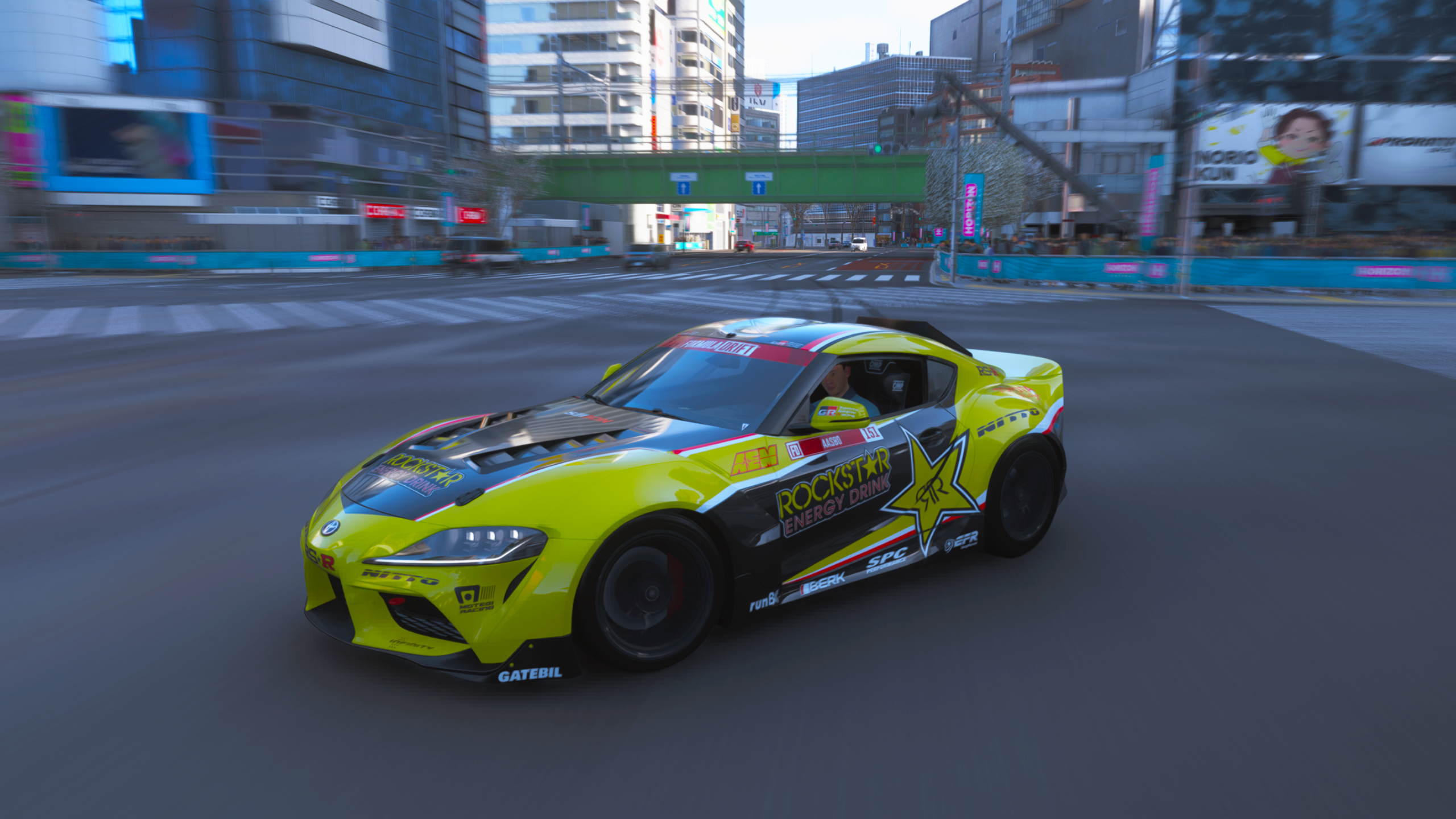 Forza Horizon 6 Shibuya Crossing Tokyo Drift: A close-up of a yellow Formula Drift driving through the iconic Shibuya Crossing.