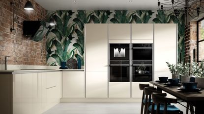 Wickes deal: Wickes kitchen interior white cupboards leafy wallpaper