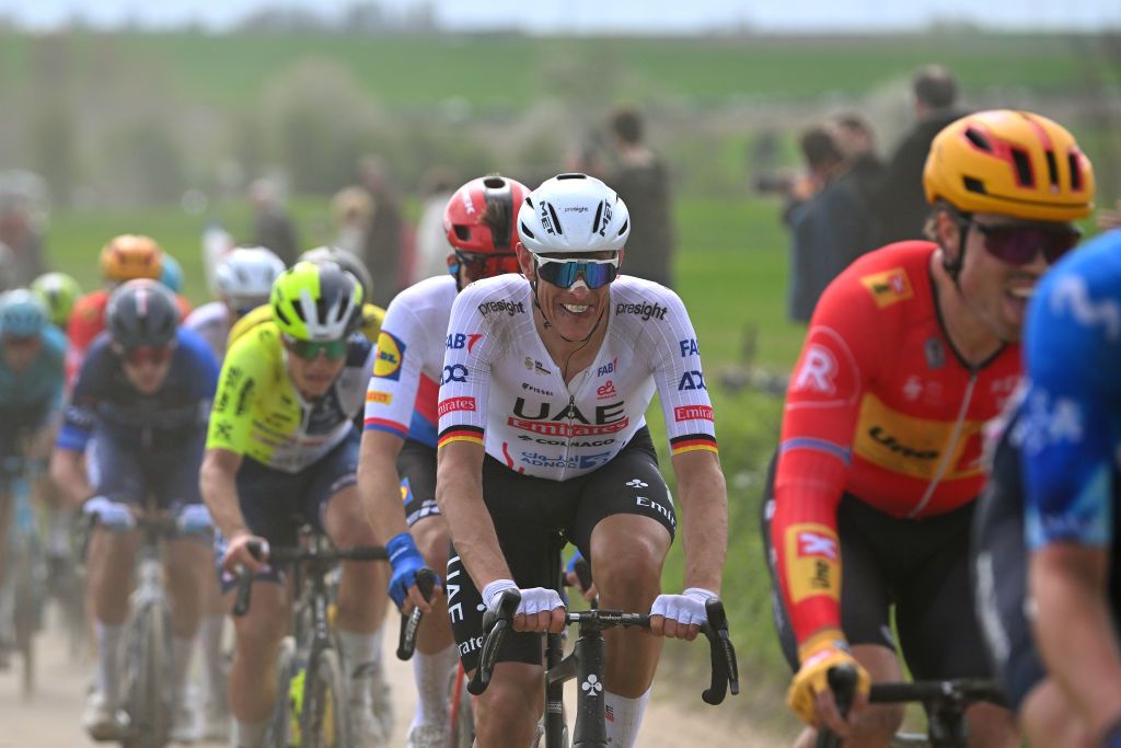 ROUBAIX FRANCE APRIL 07 Nils Politt of Germany and UAE Team Emirates competes passing through the Capelle Ruesnes cobblestones sector during the 121st ParisRoubaix 2024 a 2597km one day race from Compiegne to Roubaix UCIWT on April 07 2024 in Roubaix France Photo by Luc ClaessenGetty Images