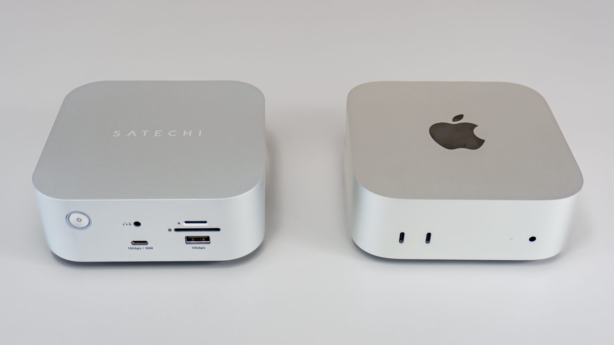 The Satechi Thunderbolt 5 Cube Dock on the left next to an Apple Mac mini M4 on the right