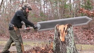 Swordmaker Michael Cthulhu slicing a giant sword into a tree stump