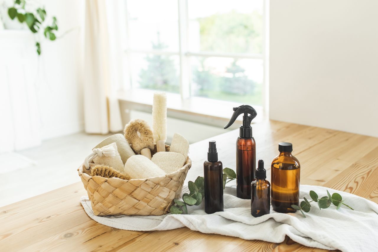 A selection of cleaning products on the floor.