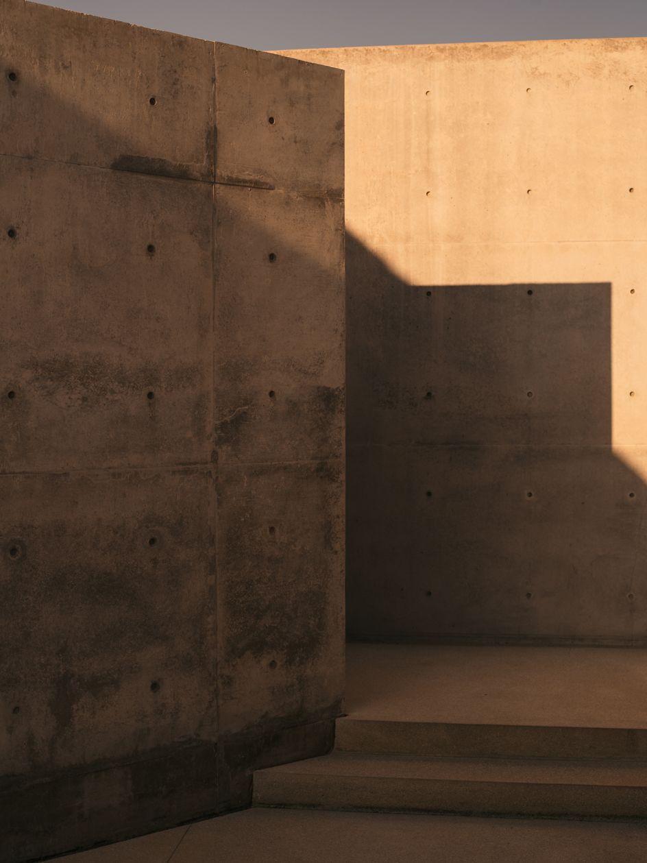 The use of exposed concrete, a Tadao Ando signature, responds to the Japanese philosophy of wabi-sabi