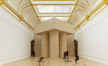 Large wooden structure in museum room