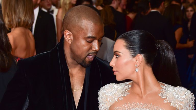 Kanye West and Kim Kardashian on the red carpet.