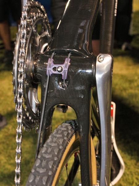 The derailleur cables exit the down tube just ahead of the press-fit bottom bracket.